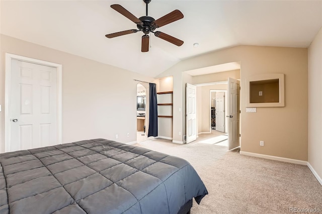 carpeted bedroom featuring vaulted ceiling and ceiling fan