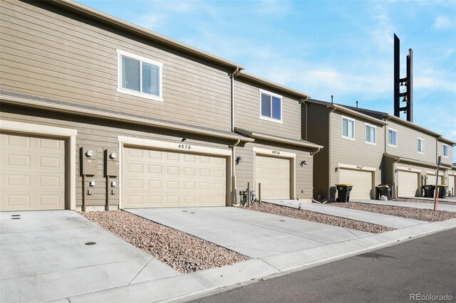 4026 Tiberias Pt, Colorado Springs, CO 80916 - view of front facade featuring a garage