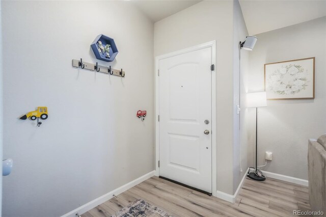 4026 Tiberias Pt, Colorado Springs, CO 80916 - doorway featuring light hardwood / wood-style flooring