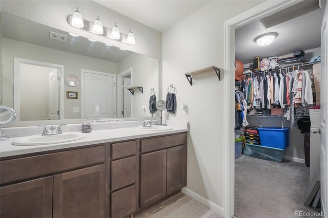 4026 Tiberias Pt, Colorado Springs, CO 80916 - bathroom with vanity