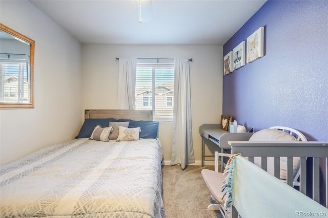 4026 Tiberias Pt, Colorado Springs, CO 80916 - bedroom featuring light colored carpet