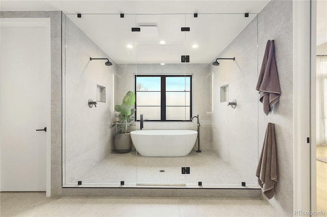1983 S Logan St, Denver, CO 80210 - full bath with a freestanding bath, a stall shower, and recessed lighting