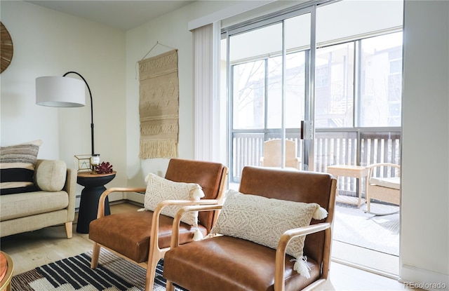 3450 S Poplar St Unit 307, Denver, CO 80224 - living area with wood finished floors