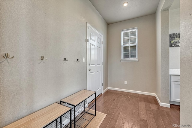 23957 E Rocky Top Ave, Aurora, CO 80016 - mudroom featuring wood finished floors and baseboards