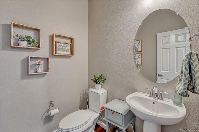 23957 E Rocky Top Ave, Aurora, CO 80016 - bathroom with a sink and toilet