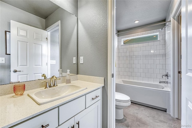 23957 E Rocky Top Ave, Aurora, CO 80016 - full bath with vanity, tile patterned floors, a textured wall, a textured ceiling, and shower / bathtub combination
