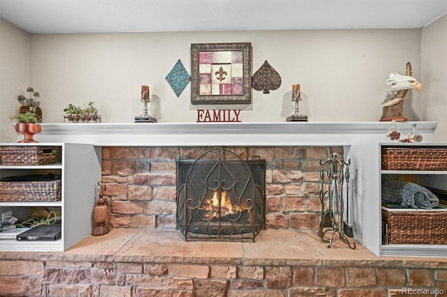 12625 W 66th Cir, Arvada, CO 80004 - detailed view of a lit fireplace