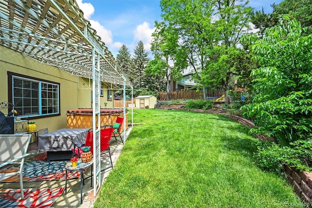 12625 W 66th Cir, Arvada, CO 80004 - view of yard with a hot tub and a patio
