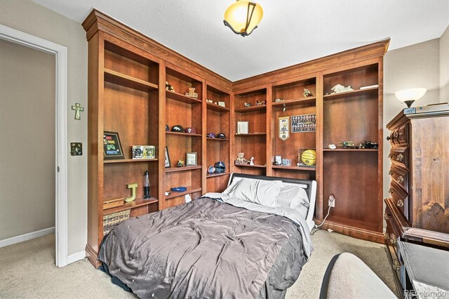 12625 W 66th Cir, Arvada, CO 80004 - carpeted bedroom featuring baseboards