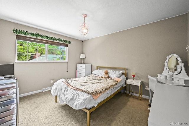 12625 W 66th Cir, Arvada, CO 80004 - bedroom with carpet flooring and baseboards