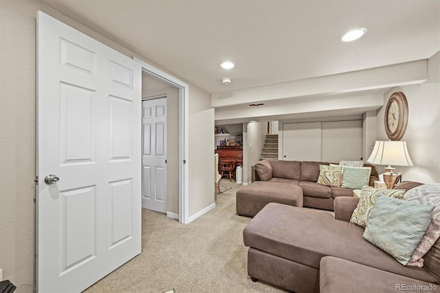 12625 W 66th Cir, Arvada, CO 80004 - living room featuring light carpet, recessed lighting, baseboards, and stairway