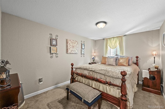 12625 W 66th Cir, Arvada, CO 80004 - carpeted bedroom featuring a textured ceiling, baseboards, and a textured wall