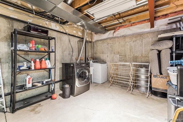 basement featuring washing machine and dryer