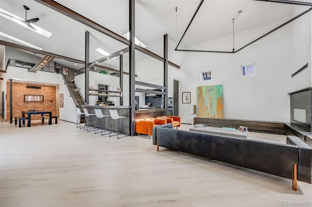 2801 Lawrence St, Denver, CO 80205 - living room with a high ceiling and wood finished floors