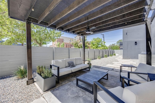 2801 Lawrence St, Denver, CO 80205 - view of patio / terrace with an outdoor living space, a fenced backyard, and a ceiling fan