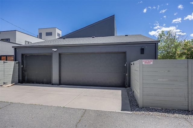 2801 Lawrence St, Denver, CO 80205 - garage with fence