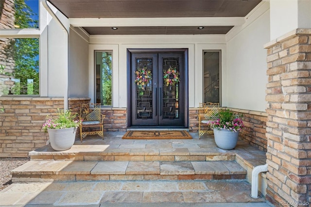 doorway to property featuring french doors