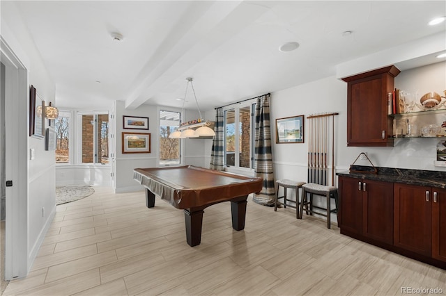 rec room featuring pool table, beam ceiling, and light hardwood / wood-style floors