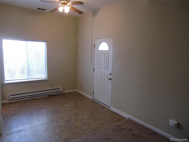 entryway with a baseboard heating unit and ceiling fan