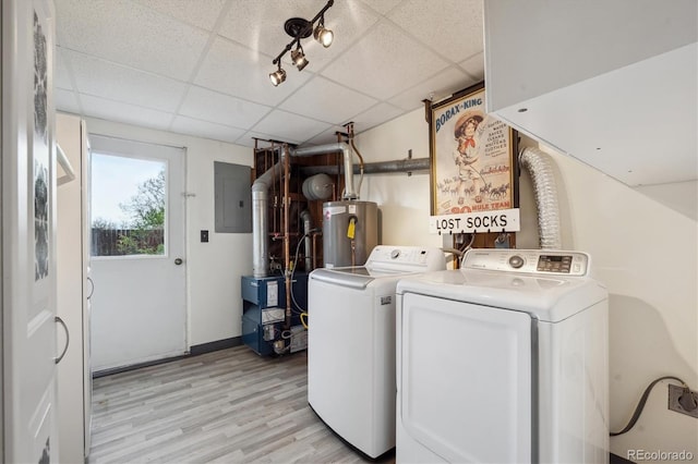 washroom with electric panel, laundry area, independent washer and dryer, light wood finished floors, and water heater