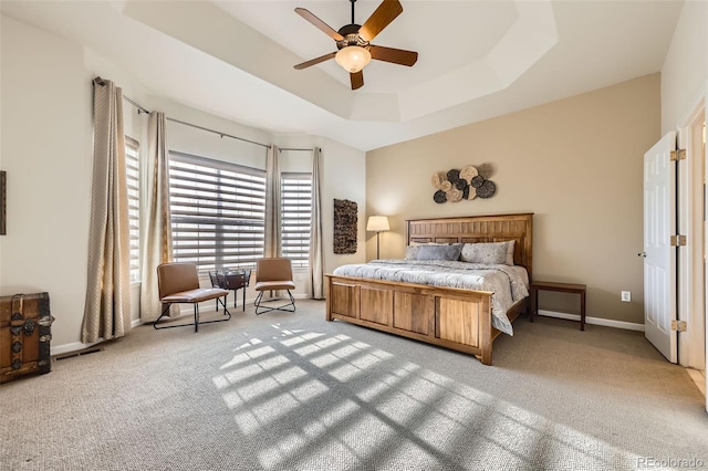 16626 Las Brisas Dr, Broomfield, CO 80023 - bedroom featuring light colored carpet, a raised ceiling, and a ceiling fan