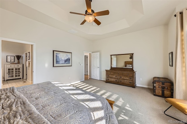 16626 Las Brisas Dr, Broomfield, CO 80023 - bedroom with a towering ceiling, light carpet, a tray ceiling, and ceiling fan