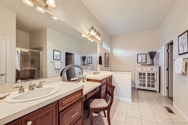 16626 Las Brisas Dr, Broomfield, CO 80023 - full bathroom with vanity, tile patterned flooring, and a stall shower