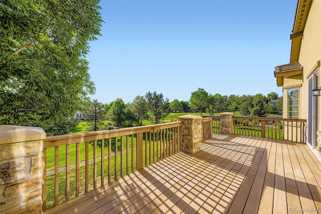 16626 Las Brisas Dr, Broomfield, CO 80023 - wooden deck featuring a yard and view of scattered trees