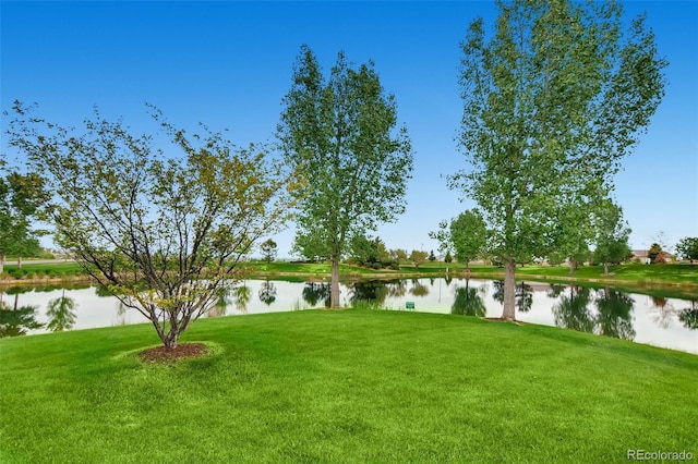 16626 Las Brisas Dr, Broomfield, CO 80023 - view of grassy yard with a water view