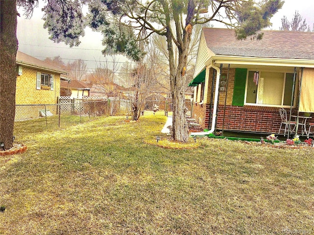 view of yard featuring a fenced backyard