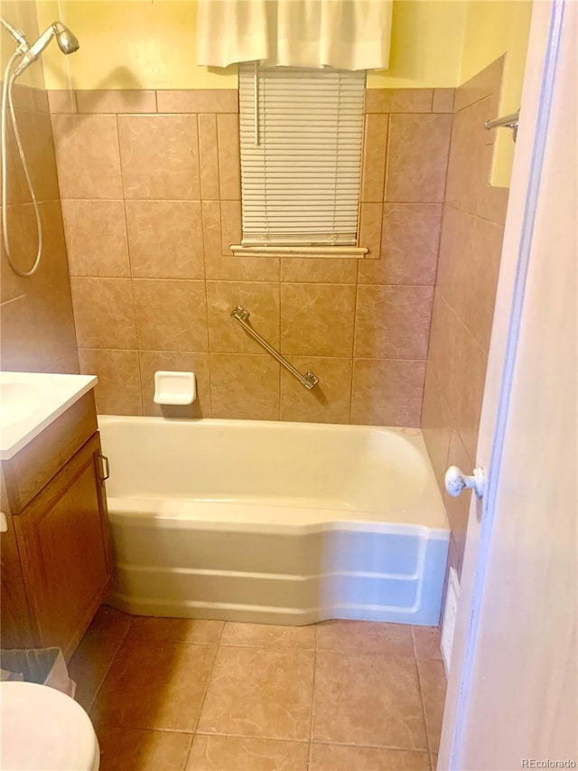 full bath with toilet, bathtub / shower combination, tile patterned flooring, and vanity