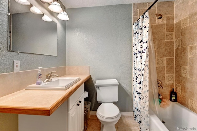 full bathroom with toilet, vanity, shower / tub combo with curtain, and tile patterned flooring