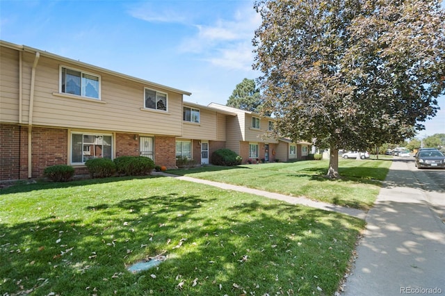 view of front facade with a front yard