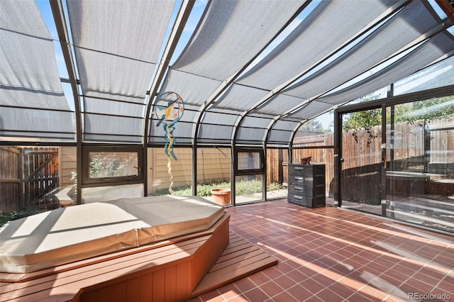 interior space with a covered hot tub