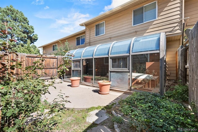 rear view of house with a patio area