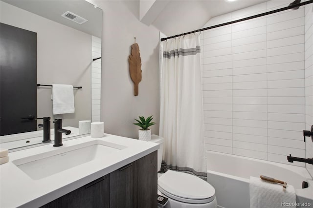 bathroom with toilet, vanity, shower / bath combo with shower curtain, and visible vents