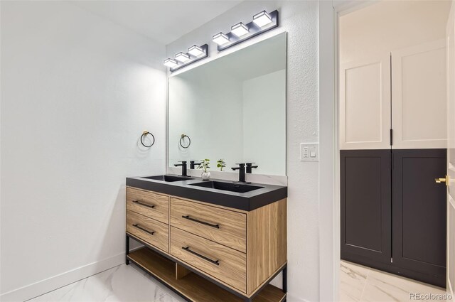 10295 E Evans Ave Unit 114, Aurora, CO 80247 - full bath with marble look tile flooring and double vanity