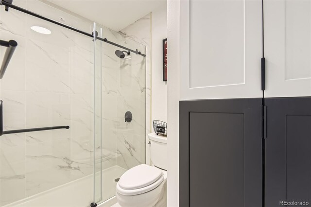 10295 E Evans Ave Unit 114, Aurora, CO 80247 - full bathroom featuring a marble finish shower and toilet