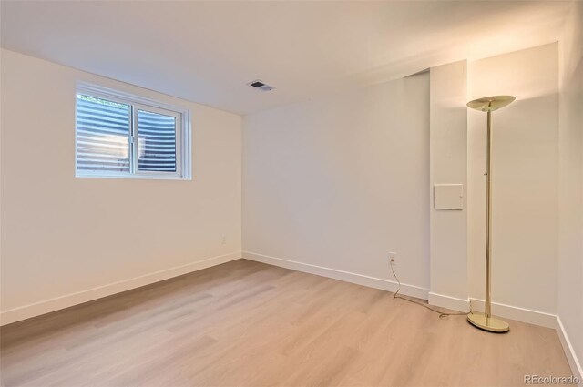 10295 E Evans Ave Unit 114, Aurora, CO 80247 - unfurnished room with light wood-style floors and baseboards