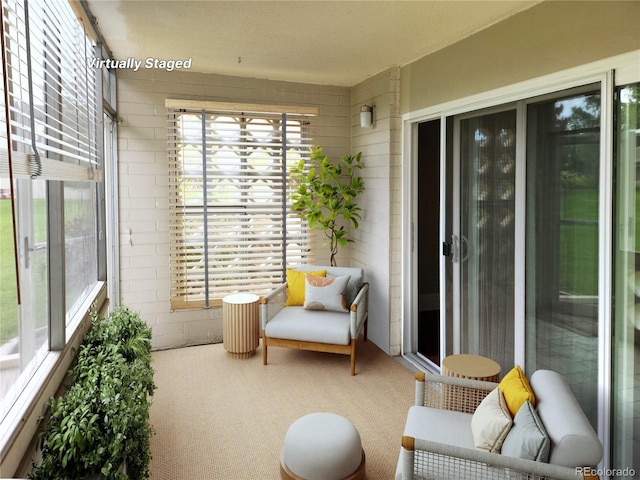 9300 E Center Ave Unit 6A, Denver, CO 80247 - sunroom / solarium featuring plenty of natural light and carpet