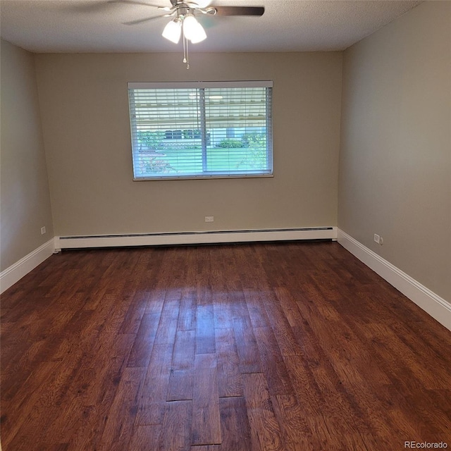 9300 E Center Ave Unit 6A, Denver, CO 80247 - unfurnished room with dark wood finished floors, ceiling fan, and a baseboard heating unit