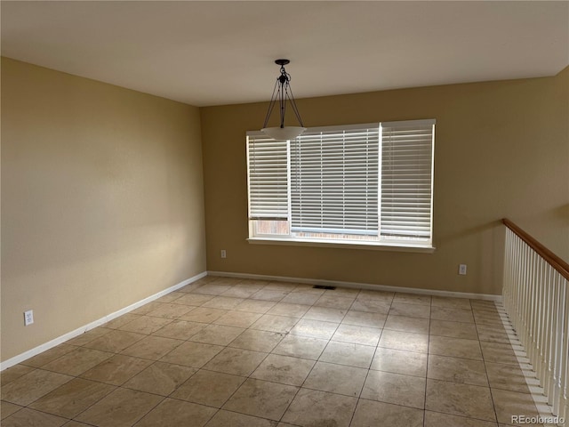 20304 E 47th Pl, Denver, CO 80249 - empty room with tile patterned flooring and baseboards