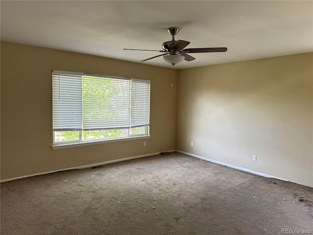 20304 E 47th Pl, Denver, CO 80249 - unfurnished room with carpet, ceiling fan, and baseboards