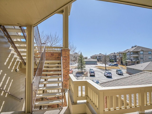 exterior space featuring a residential view and stairway