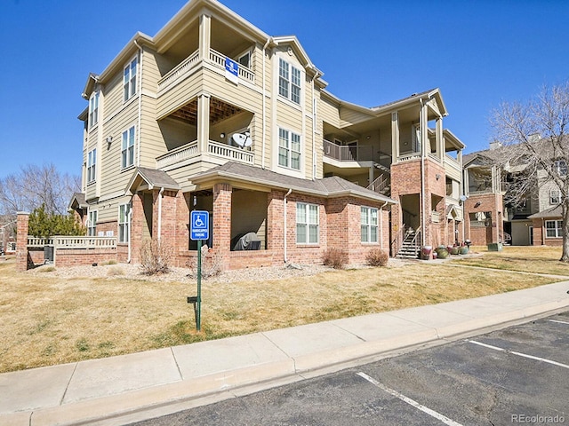 view of property with uncovered parking