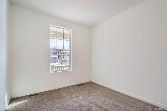 view of carpeted spare room