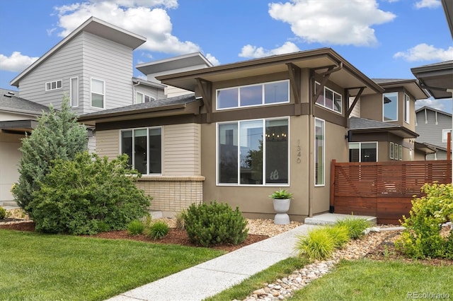 1340 W 68th Ave, Denver, CO 80221 - view of front of house featuring stucco siding