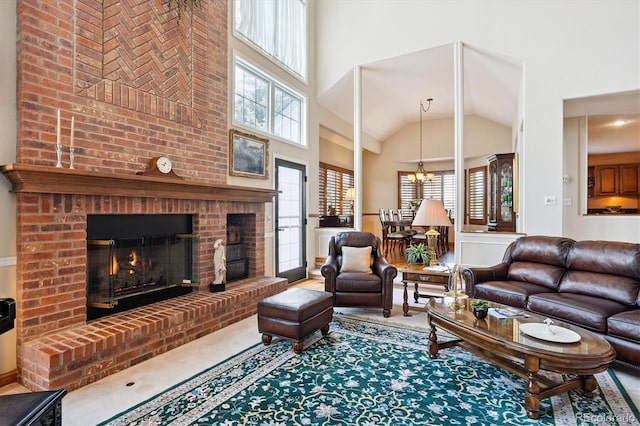 9416 Kemper Dr, Lone Tree, CO 80124 - living room with high vaulted ceiling, a fireplace, carpet flooring, and a chandelier