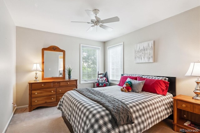 9416 Kemper Dr, Lone Tree, CO 80124 - bedroom with light colored carpet and ceiling fan
