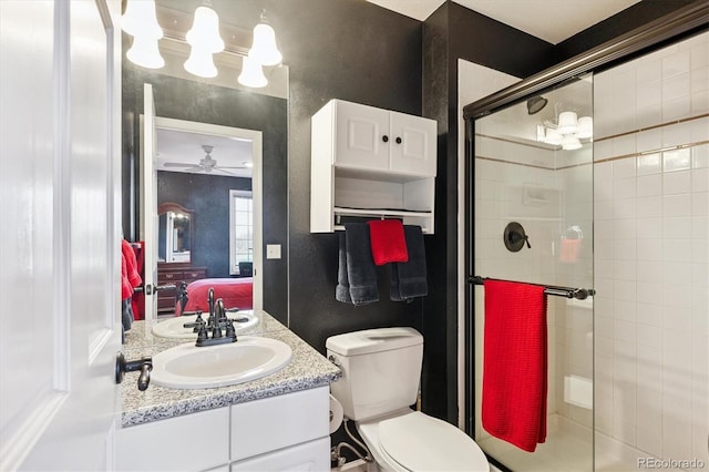 9416 Kemper Dr, Lone Tree, CO 80124 - bathroom with a shower stall, vanity, and ceiling fan